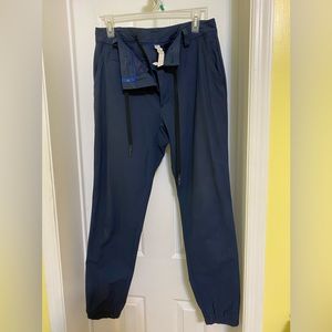 Men’s  Lululemon blue size 32 pants. Elastic ankle pockets draw string EUC
